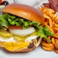 All-American Cheeseburger · Choice of cheese on a brioche bun. served with lettuce tomato onions and pickles.