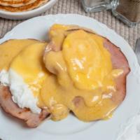 Classic Eggs Benedict · Shaved ham, poached eggs. hollandaise, green onions, toasted English muffin. 760 сalories.
