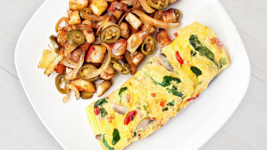 Very Veggie Omelette · Fresh spinach bell peppers onions mushrooms roasted red peppers tomatoes garlic seasoning and jack cheese. vegetarian.
