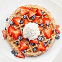 Berry Berry Belgian Waffle · Fresh strawberries blueberries whipped cream and powdered sugar.