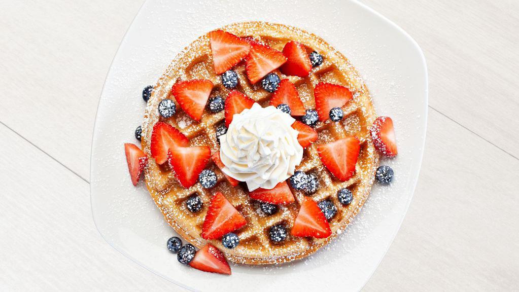 Berry Berry Belgian Waffle · Fresh strawberries, blueberries, whipped cream, powdered sugar. 330 calories.