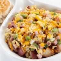 Farmers Skillet · Seasoned home fries ham crumbled sausage onions bell peppers; topped with cheddar cheese.