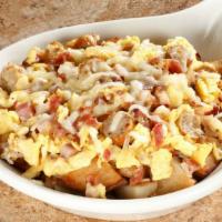 Meat Lovers Skillet · Seasoned home fries, ham, bacon, sausage;  topped with jack cheese. 850 calories.