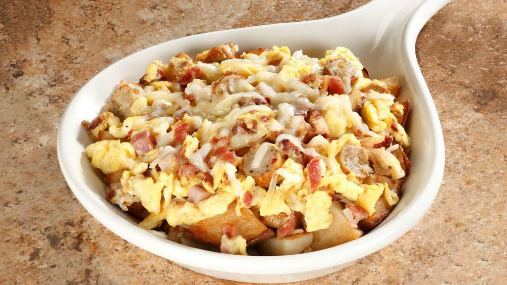Meat Lovers Skillet · Seasoned home fries ham bacon sausage; topped with jack cheese.