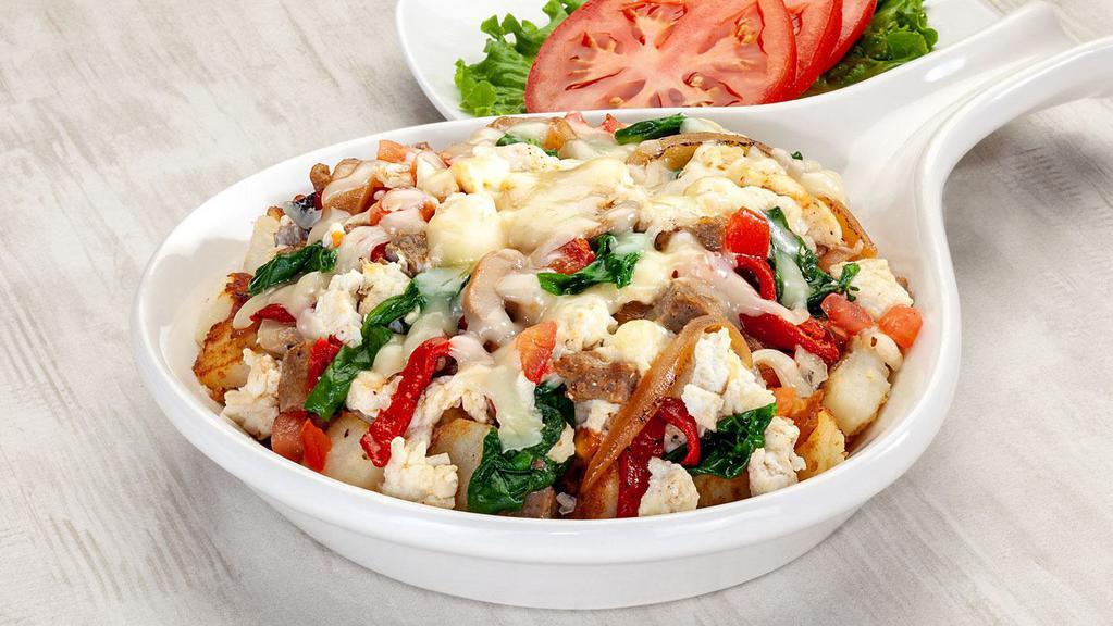 Almost Healthy Skillet · Seasoned home fries, fresh spinach, roasted red peppers, caramelized onions, mushrooms, tomatoes, turkey sausage, egg whites, topped with jack cheese. 710 calories.