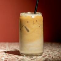 Iced Caffe Latte · Made with milk blended with our rich, freshly ground and brewed EllaMia espresso over ice.