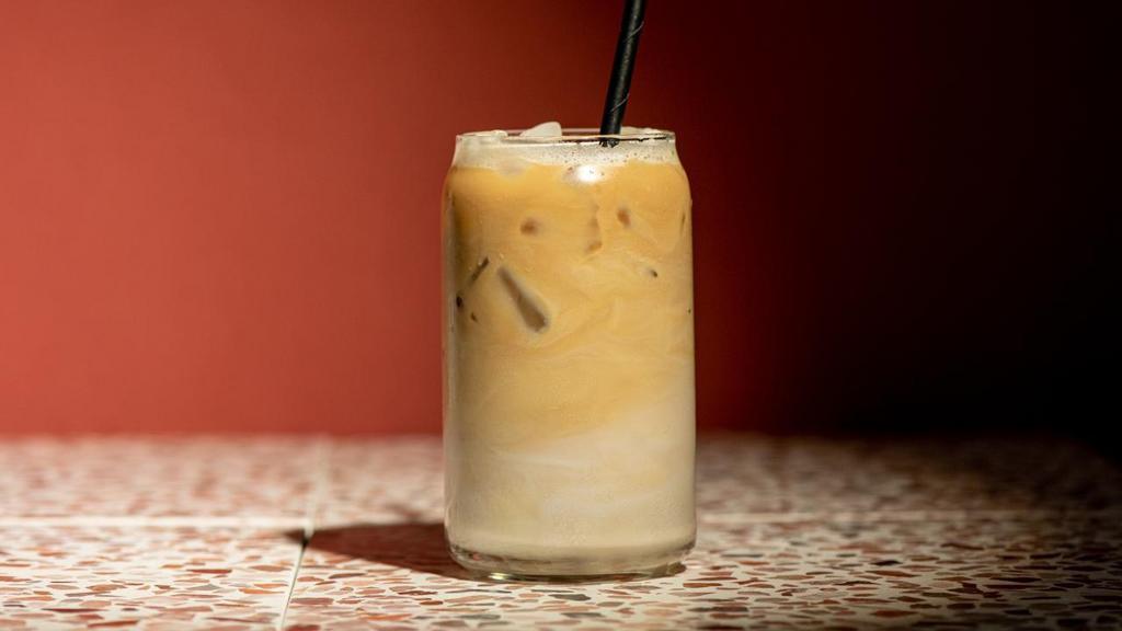 Iced Chai Latte · Black tea infused with cinnamon, clove, and other warming spices with milk over ice.