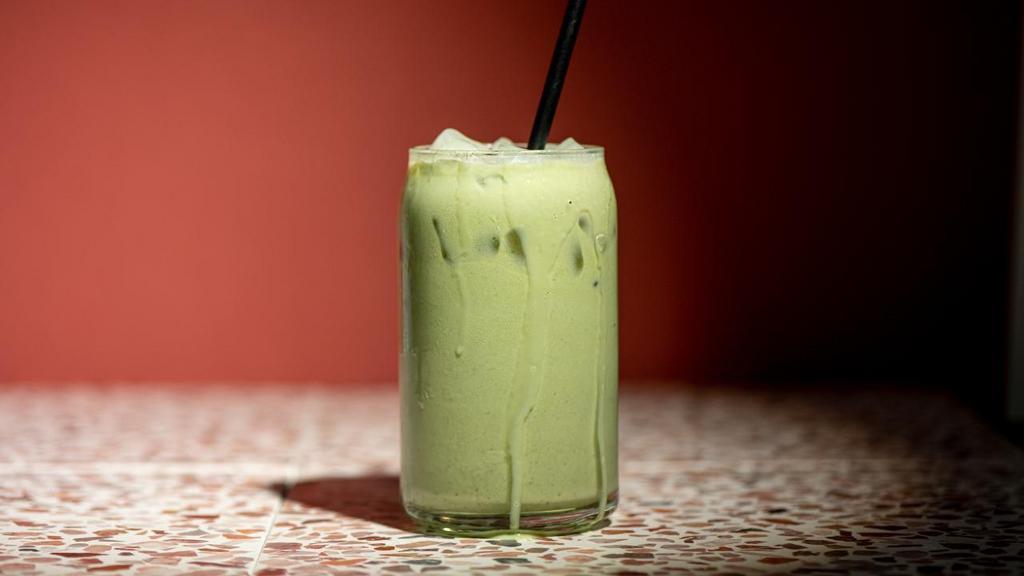 Iced Matcha Latte · Smooth and creamy matcha blended with milk and served over ice.