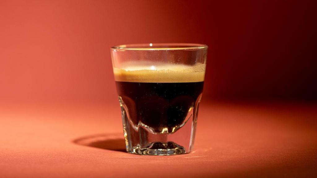 Espresso · Brewed under 9-10 bars of pressure through finely ground coffee
