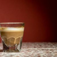 Macchiato · EllaMia espresso with a dash of frothy steamed milk.
