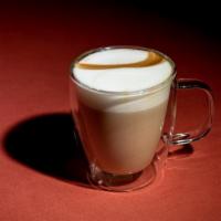 Cappuccino · Prepared with equal parts double espresso, steamed milk, and steamed milk foam on top.