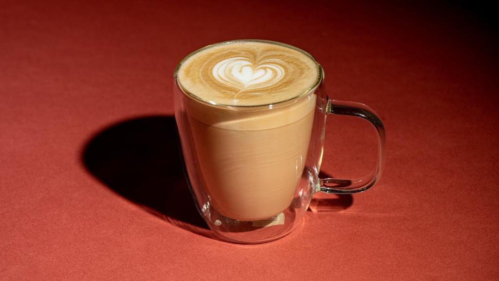 Caffe Latte · EllaMia espresso and steamed milk.