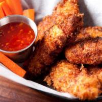 Hot Chicken Tenders · Mouthwatering chicken tenders, tossed in High-heat hot sauce, and fried to perfection.