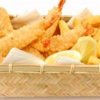 Fried Shrimp & Chips With Teriyaki Sauce · Hot N' Fresh Fried Shrimp, served on a bed of golden delicious fries. Served with Teriyaki s...