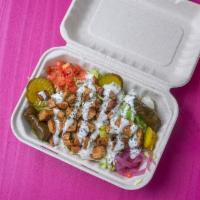 Salads · Your choice of Vegan Meat over Lettuce, Tomato, Grape Leaves, and White sauce on top