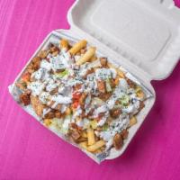 Loaded Fries · Your choice of Vegan Meat over Seasoned French Fries, Parsley, Tomatoes, and White Sauce