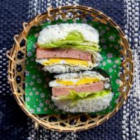 Aloha Spam Onigirazu · Two rice ball sandwiches, spam, egg, and lettuce with Japanese mayonnaise, rice, and seaweed.