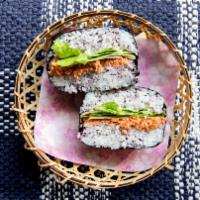 Salmon & Shiso Onigirazu · Two rice ball sandwich with salmon, shiso, lettuce. Japanese mayo, rice, and seaweed.