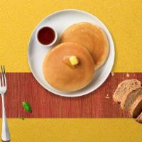 Classic Pancakes · Fluffy pancakes cooked with care and love served with butter and maple syrup.