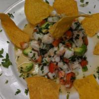 Ceviche · Gluten free. Chunks of fish marinated in citrus juices, seasoned with onions, cilantro, avoc...