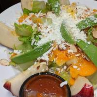 Apple Salad · Fresh romaine and iceberg mix, red and green apples, dried cranberries, queso fresco and sli...