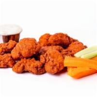 *Boneless Wings* · Crispy chicken wings tossed in our signature Tap Room hot sauce and served with celery, carr...