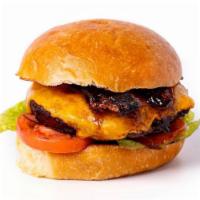 *Whiskey Burger* · Choice of our signature blend burgers, topped with Jameson-infused bacon, cheddar cheese and...