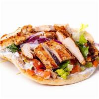 *Blackened Gyro* · Grilled Cajun chicken on top of fresh pita bread and topped with lettuce, tomato, red onion ...