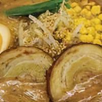 Teppen Miso Ramen · Pork and chicken soup, miso paste, wavy noodle, char-sui pork, seasoned boiled egg, bean spr...
