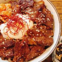  Wagyu Yakiniku Don · Thinly sliced wagyu, onion, string red pepper (on top), sesame, special japanese sauce, and ...