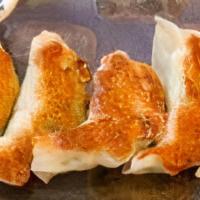 Homemade Pork Gyoza(5) · Pan-fried pork dumplings.