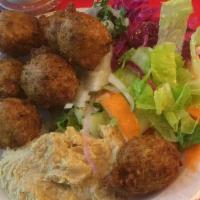 Falafel Dinner Plate · Served with white rice, hummus, green salad and red cabbage.