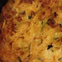 Zucchini Pancake · Blended with zucchini, feta cheese, dill, flour, egg. Lightly pan fried and served with garl...