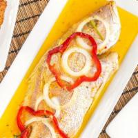 Large Pwason/Fish · Whole red snapper steamed or fried with sea salt, onions, and sweet pepper.