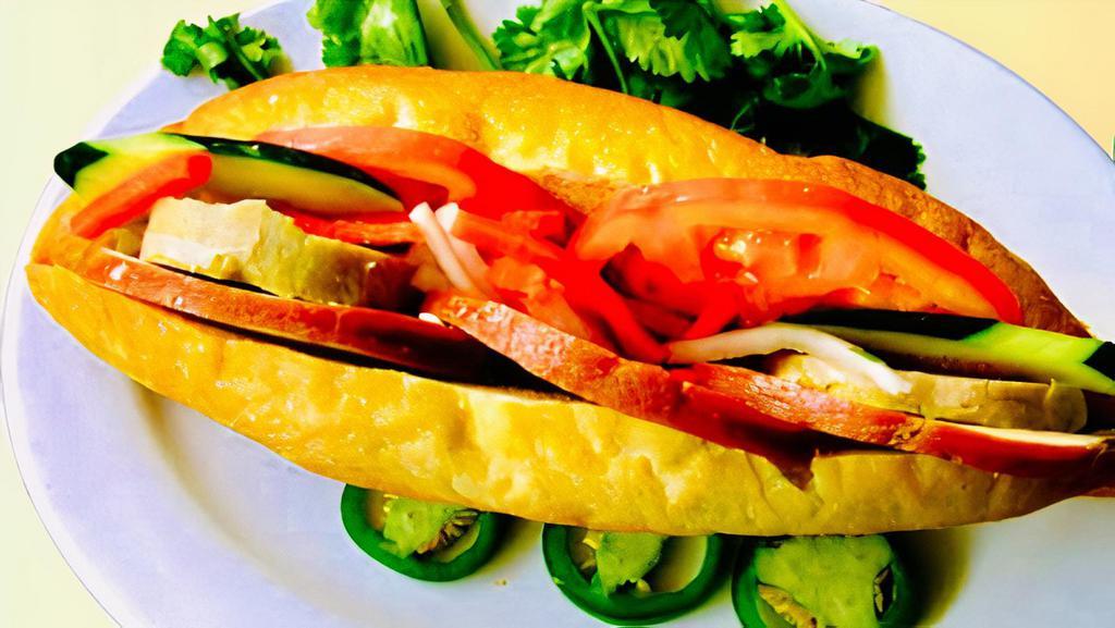 18- Sandwich With Special Combination Of Char Siu Pork, Vietnamese Steamed Pork Roll & Pâté  / Banh Mì Thịt Giỏ Lụa & Pâté · 