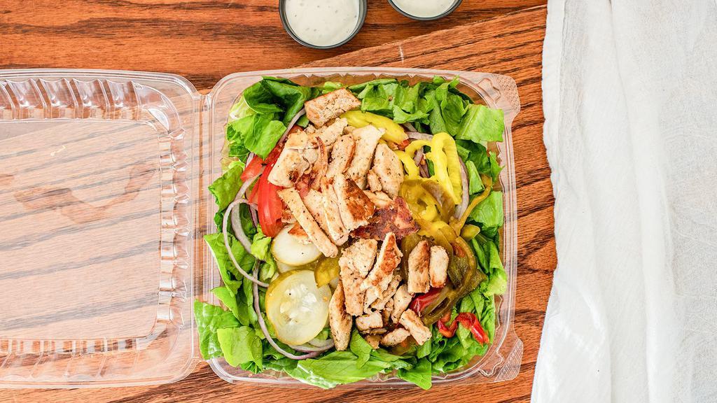 Grilled Chicken Over Salad · Grilled chicken over a bed of salad