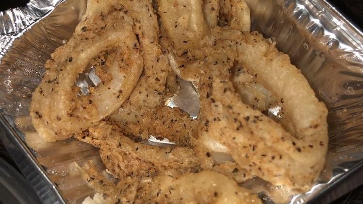 Golden Calamari · Calamari battered then fried to a golden crisp. Served with sweet chili sauce and ground peanut.