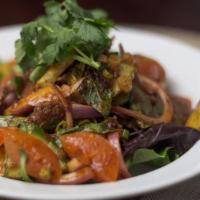 Yum Nur Salad · Spicy. Sliced grilled beef with red onion, cucumber, tomatoes, scallions and mint tossed spi...