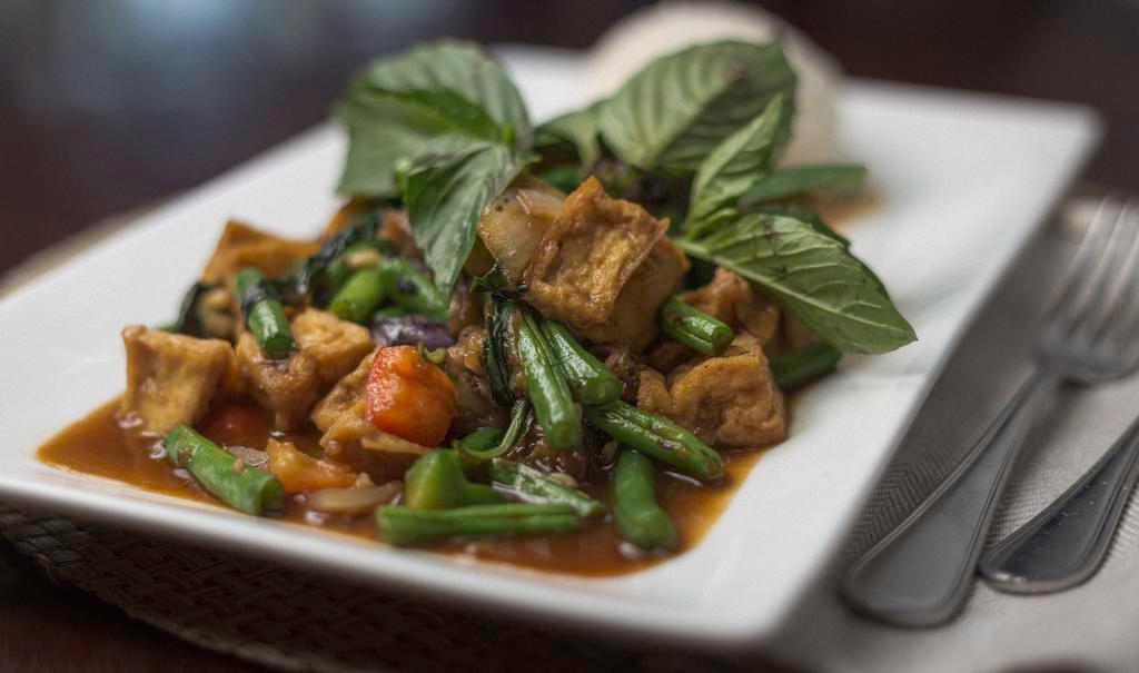 Vegetarian Triple Play · Vegetarian. A combination of tofu, eggplant and string beans served with a choice of garlic or basil sauce and jasmine rice.
