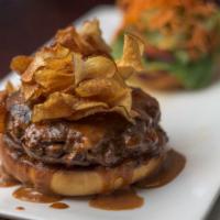 Thaiger Special · 8 oz. minced beef burger glazed with peanut sauce. Served Thai style.