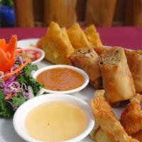 River Thai Vegetable Platter · Platter of 2 spring rolls, 2 curry puffs, 4 fried vegetable dumpling, 4 Crispy Tofu served w...