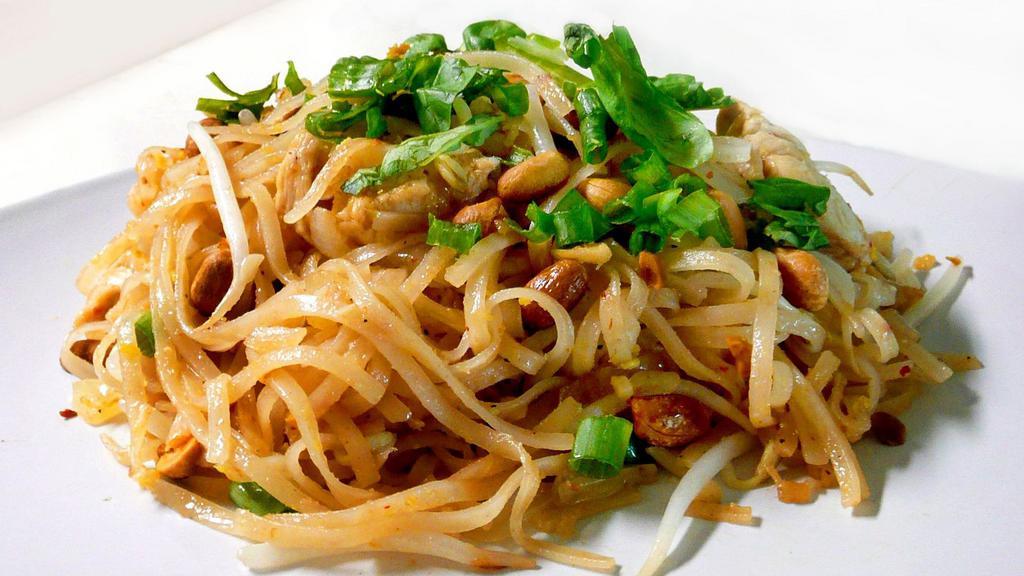 Pad Thai · Pad thai is made with soaked dried rice noodles, which are stir-fried with eggs, chopped firm tofu, and flavored with tamarind pulp, fish sauce, dried shrimp, garlic or shallots, red chili pepper, and palm sugar and served with lime wedges and often chopped roasted peanuts.