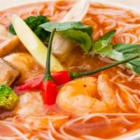 Tom Yum Noodle Soup · Rice Noodle with scallion, beansprout, ground peanut, fried garlic, cilantro in Tom Yam Soup