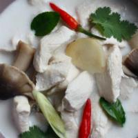 Tom Kha Chicken Soup · Coconut soup with chicken, onion, bell pepper,cilantro