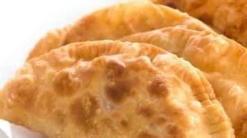 Empanadas · MACA style fried patties stuffed with beef, chicken, or cheese (2 pieces).