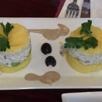 Causa De Pollo O Atun · Peruvian style mashed potatoes filled with chicken or tuna salad.