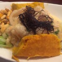 Ceviche Mixto · Diced fish filet and seafood in lemon juice and hot pepper, served with corn and sweet potat...
