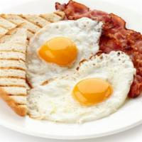 2 Eggs With Meat Plate · Two eggs, ham or bacon or sausage. Potatoes and toast.