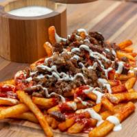 Gyro Fries · Our delicious fries served with gyro meat with our white sauce and oil bay seasoning. 



In...