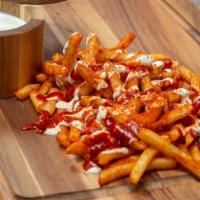 Mean Fries · Fries topped with white and red sauce.

PS: The sauces make them mean!